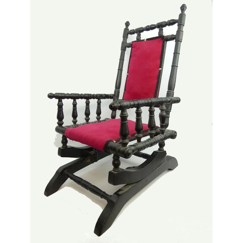 403 - Edwardian child's American type rocking chair. 69cm high. Collection only.