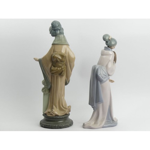 309 - Lladro porcelain figurines of oriental ladies, 38cm & 33cm. UK Postage £20.