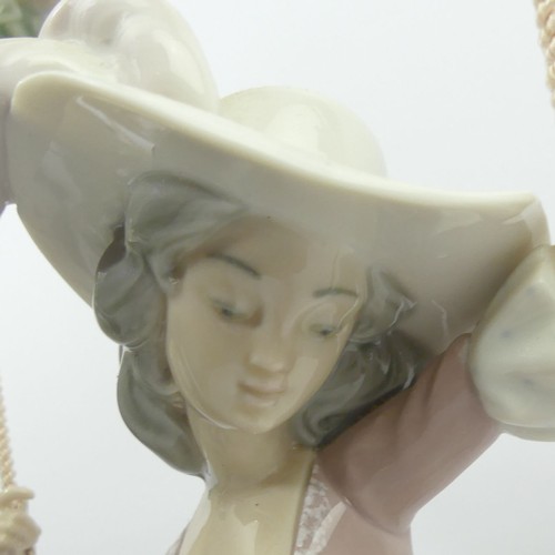 307 - Lladro porcelain figure 'Girl on a Swing' model 1297, 40cm. Collection Only