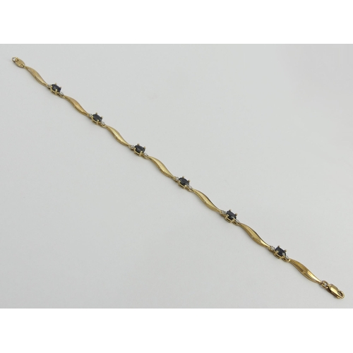 19 - 9ct gold sapphire and diamond bracelet, 4.3 grams, 18.5cm, 4.4mm wide. UK Postage £12.