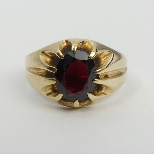 4 - 9ct gold garnet single stone ring, London 1976, 4.4 grams, 12.7mm, size Q. UK Postage £12.