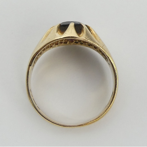 4 - 9ct gold garnet single stone ring, London 1976, 4.4 grams, 12.7mm, size Q. UK Postage £12.