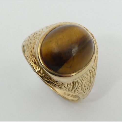 5 - 9ct gold tigers-eye single stone ring, 5.4 grams, 18.3mm, size S. UK Postage £12.