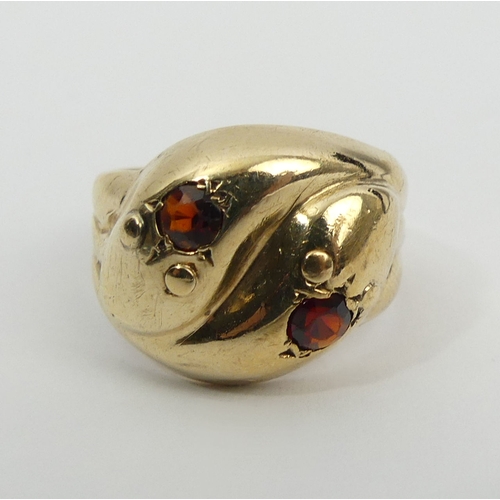 6 - 9ct gold snake head design ring with garnet eyes, Birm. 1975, 4.3 grams, 14.6mm, size L. UK Postage ... 