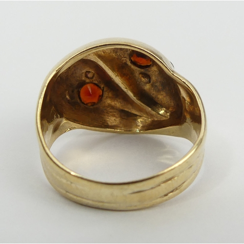 6 - 9ct gold snake head design ring with garnet eyes, Birm. 1975, 4.3 grams, 14.6mm, size L. UK Postage ... 