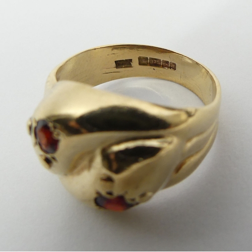 6 - 9ct gold snake head design ring with garnet eyes, Birm. 1975, 4.3 grams, 14.6mm, size L. UK Postage ... 