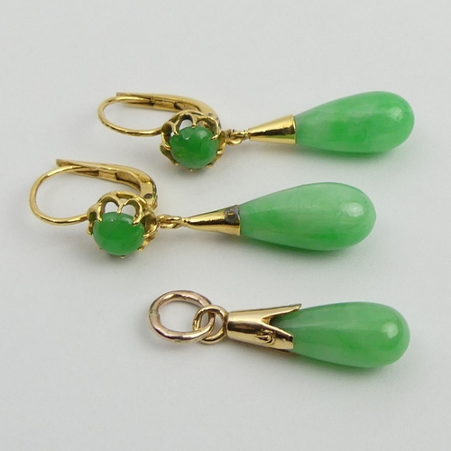 25 - A pair of 18ct gold (tested) jade drop earrings and a matching pendant, 5.5 grams. UK Postage £12.