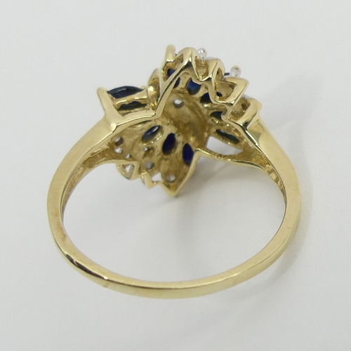 30 - 9ct gold sapphire and diamond ring, 3 grams, 16.1mm, size P. UK Postage £12.