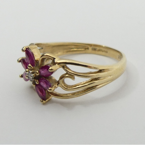 32 - 9ct gold ruby and diamond ring, 2.2 grams, 9.3mm, size M. UK Postage £12.