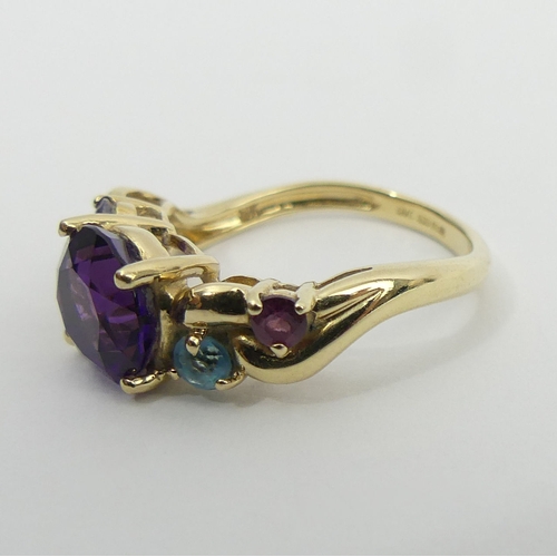 33 - 9ct gold amethyst, ruby, topaz, sapphire and peridot ring, 3 grams, 8mm, size M. UK Postage £12.