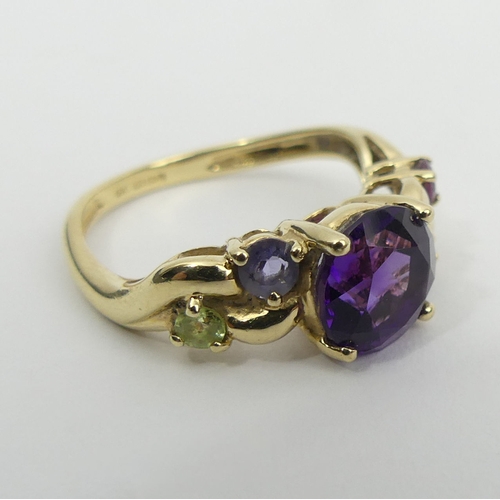 33 - 9ct gold amethyst, ruby, topaz, sapphire and peridot ring, 3 grams, 8mm, size M. UK Postage £12.