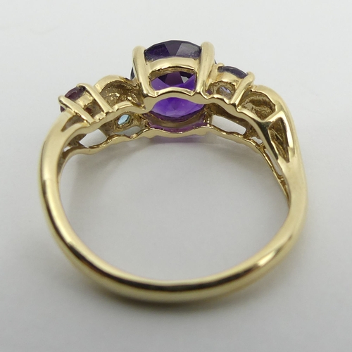 33 - 9ct gold amethyst, ruby, topaz, sapphire and peridot ring, 3 grams, 8mm, size M. UK Postage £12.