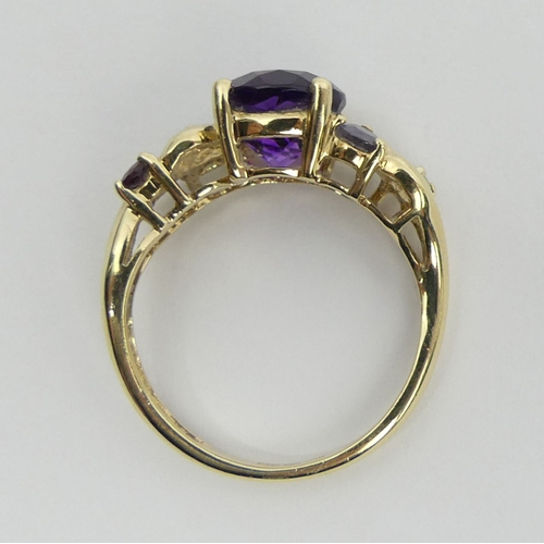 33 - 9ct gold amethyst, ruby, topaz, sapphire and peridot ring, 3 grams, 8mm, size M. UK Postage £12.