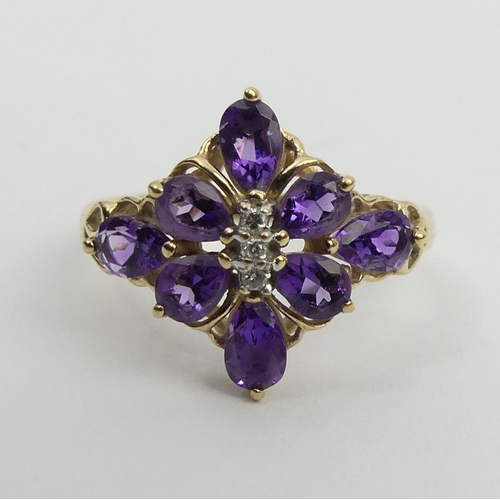 35 - 9ct gold amethyst and diamond ring, 2 grams, size M. UK Postage £12.