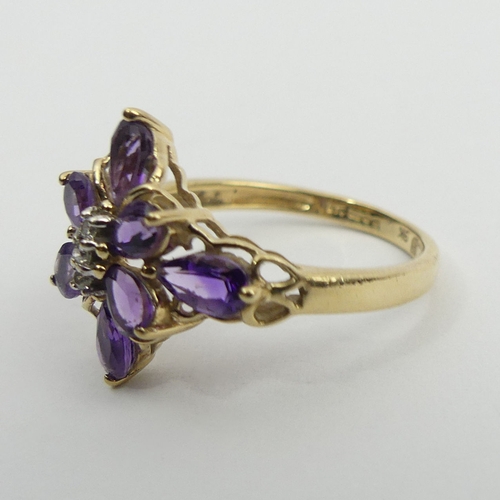 35 - 9ct gold amethyst and diamond ring, 2 grams, size M. UK Postage £12.