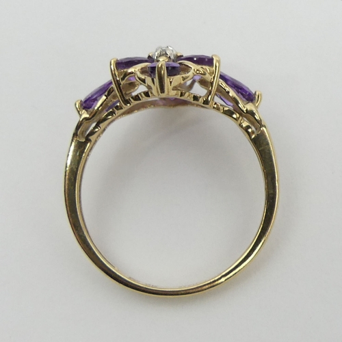 35 - 9ct gold amethyst and diamond ring, 2 grams, size M. UK Postage £12.