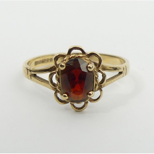 44 - 9ct gold single stone garnet ring, 1.6 grams, 10.2mm, size M. UK Postage £12.