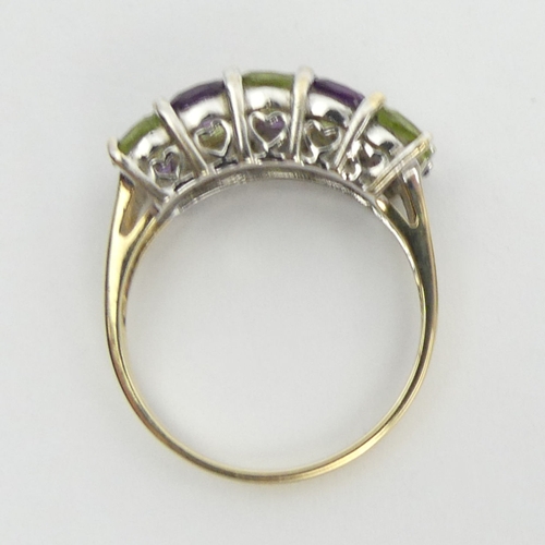 48 - 9ct gold peridot, amethyst and diamond ring, 2.4 grams, 6.6mm, size M 1/2. UK Postage £12.