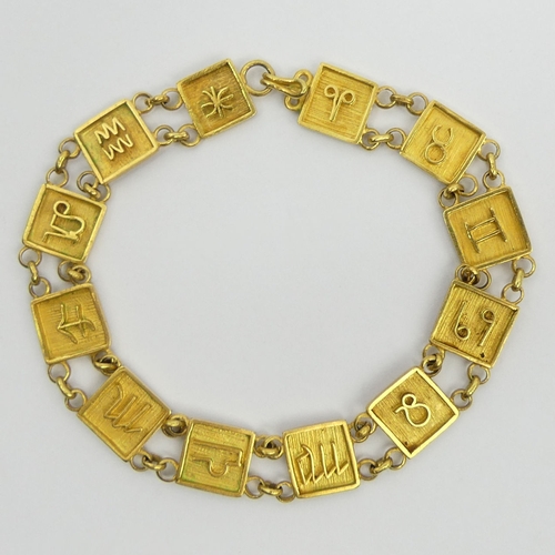 51 - 14ct gold tested zodiac design bracelet, 14 grams. UK Postage £12.