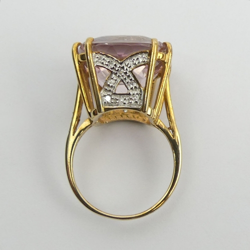 58 - 9ct gold pink topaz and diamond ring, 8.2 grams, 16.4mm, size N 1/2.  UK Postage £12