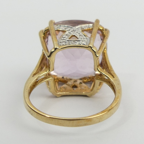 58 - 9ct gold pink topaz and diamond ring, 8.2 grams, 16.4mm, size N 1/2.  UK Postage £12