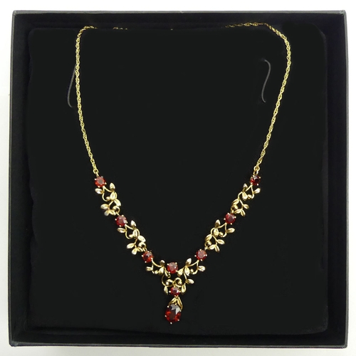 62 - 9ct gold garnet necklace, 14.4 grams, 43cm. UK Postage £12.