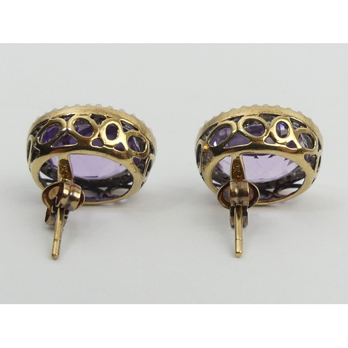 66 - A pair of 9ct gold amethyst and diamond earrings, 5 grams, 15.5 x 13.6mm. UK Postage £12.