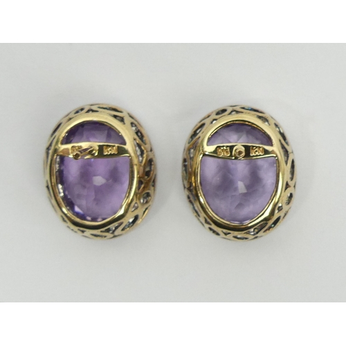 66 - A pair of 9ct gold amethyst and diamond earrings, 5 grams, 15.5 x 13.6mm. UK Postage £12.