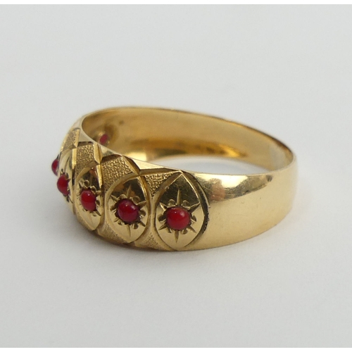 71 - 18ct gold seven stone coral ring, 2.1 grams, 8mm, size Q. UK Postage £12.