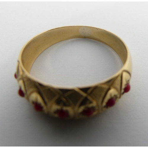 71 - 18ct gold seven stone coral ring, 2.1 grams, 8mm, size Q. UK Postage £12.