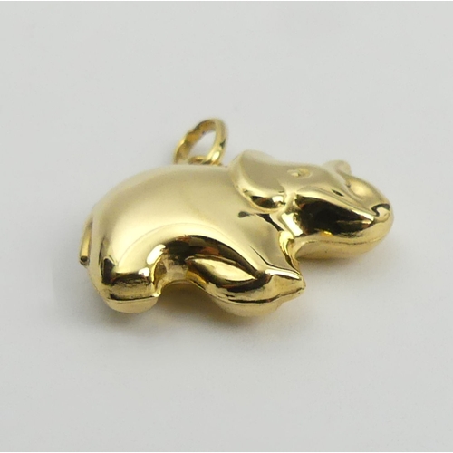 74 - 9ct gold lucky elephant pendant, 1.6 grams, 21mm. UK Postage £12.