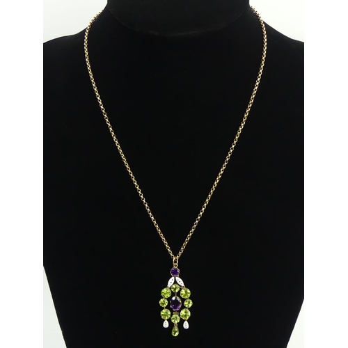 85 - 9ct gold suffragette colours amethyst, peridot and white enamel pendant and chain, 7.5 grams, pendan... 