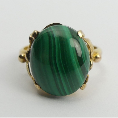 89 - 14ct gold malachite set ring, 4 grams, 14mm, size M1/2. UK Postage £12.