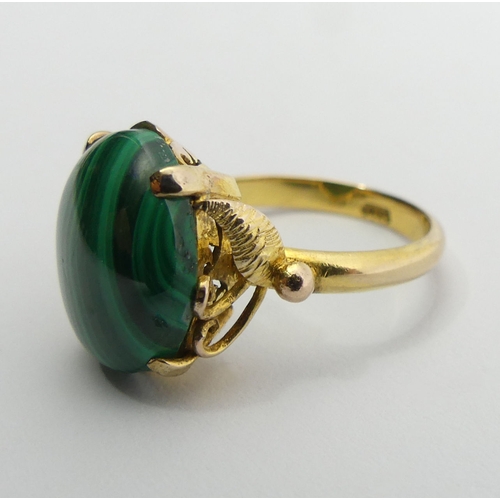 89 - 14ct gold malachite set ring, 4 grams, 14mm, size M1/2. UK Postage £12.