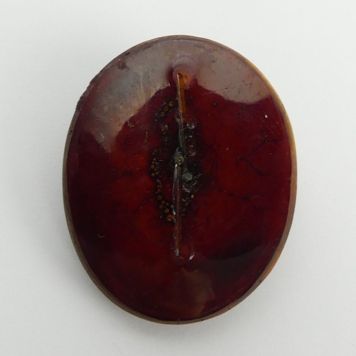 92 - Carved amber oval cameo, 12 grams, 42 x 35mm.  UK Postage £12.