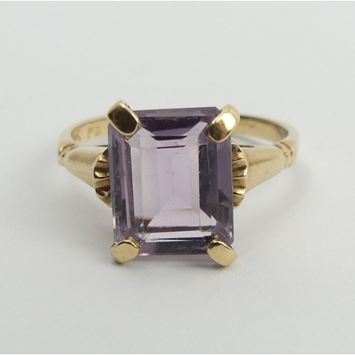 93 - 9ct gold amethyst single stone ring, 2.6 grams, 11.4mm, size O.  UK Postage £12.