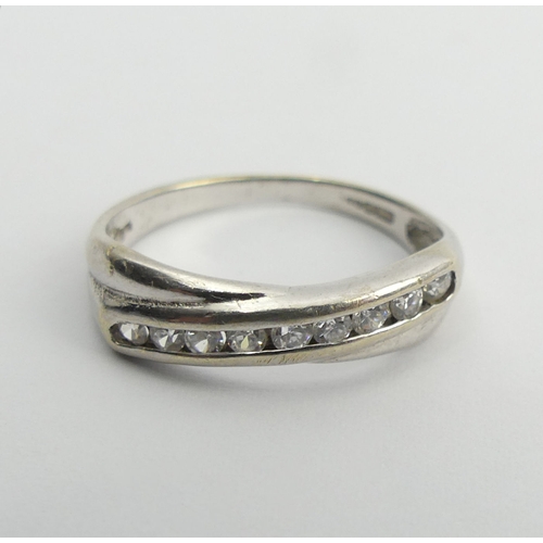 95 - 9ct white gold diamond nine stone ring, 2.3 grams, 5.3mm, size O.  UK Postage £12.