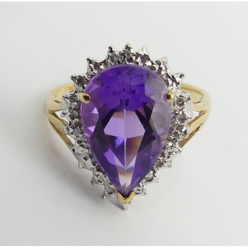 102 - 18ct gold amethyst and diamond ring, 4 grams, 18.3mm size N1/2.  UK Postage £12.