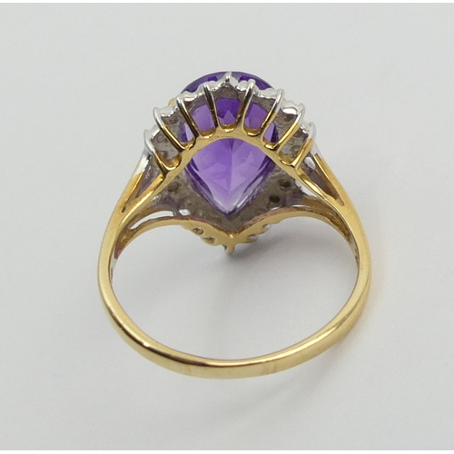 102 - 18ct gold amethyst and diamond ring, 4 grams, 18.3mm size N1/2.  UK Postage £12.