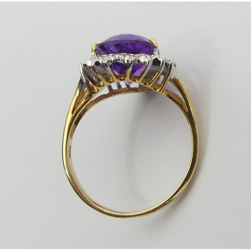 102 - 18ct gold amethyst and diamond ring, 4 grams, 18.3mm size N1/2.  UK Postage £12.