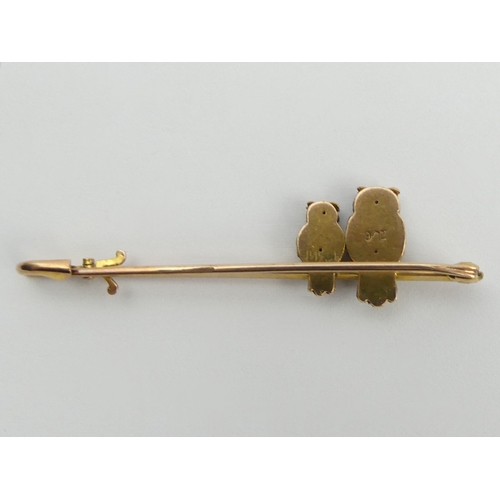 105 - 9ct rose and yellow gold owl an owlet design brooch, 2.9 grams, 50mm long.  UK Postage £12.