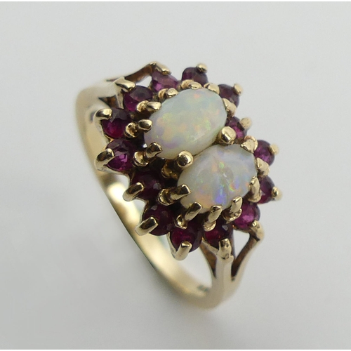 106 - 9ct gold double opal and ruby cluster ring, 3.1 grams, size N1/2.  UK Postage £12.