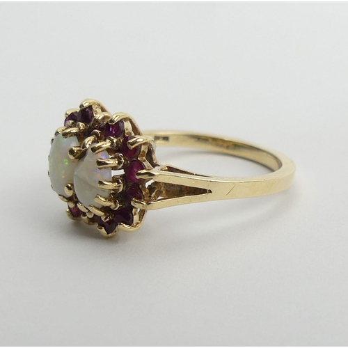 106 - 9ct gold double opal and ruby cluster ring, 3.1 grams, size N1/2.  UK Postage £12.