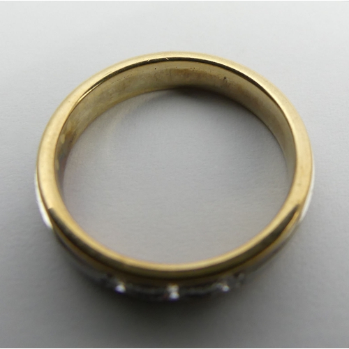 110 - 9ct two colour gold diamond, three stone ring, 3.7 grams, 4mm, size M. UK Postage £12.