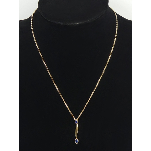 112 - 9ct gold sapphire pendant and chain, 4.7 grams, pendant 33.4mm, chain 44cm. UK Postage £12.