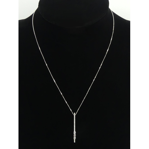 114 - 18ct white gold diamond pendant and chain, 3.5 grams, pendant 39mm, chain 43cm. UK Postage £12.