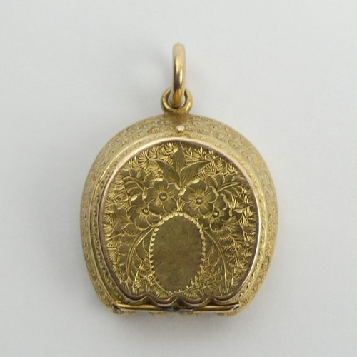 119 - Victorian 15ct gold (tested) horseshoe design locket, 6.6 grams, 33mm x 23mm. UK Postage £12.