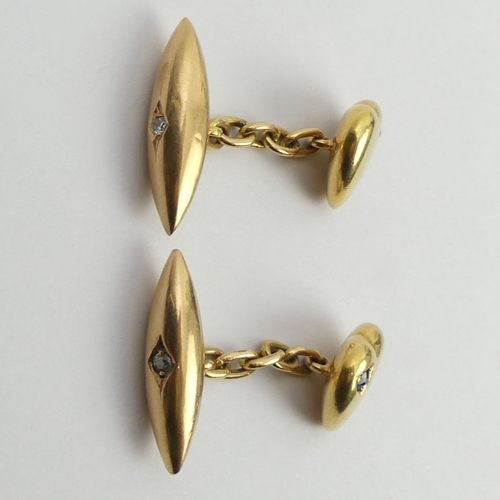 120 - A pair of 15ct gold (tested) sapphire and diamond cufflinks, 8.1 grams. UK Postage £12.