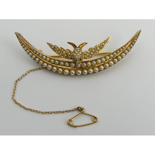 122 - 15ct gold (tested) bird and crescent brooch set with seed pearls, 10.4 grams. UK Postage £12.