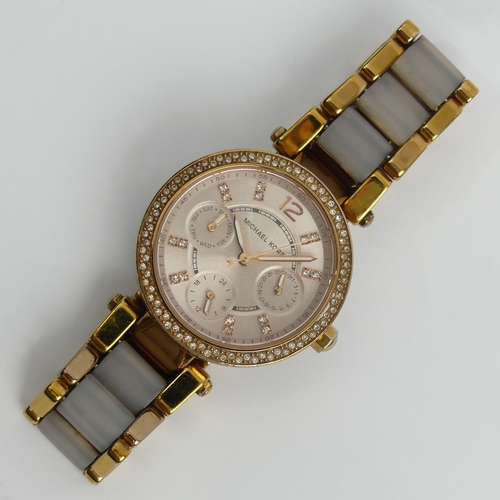 136 - Michael Kors rose gold plated crystal bezel set watch, 36mm inc. crown. UK Postage £12. Condition Re... 